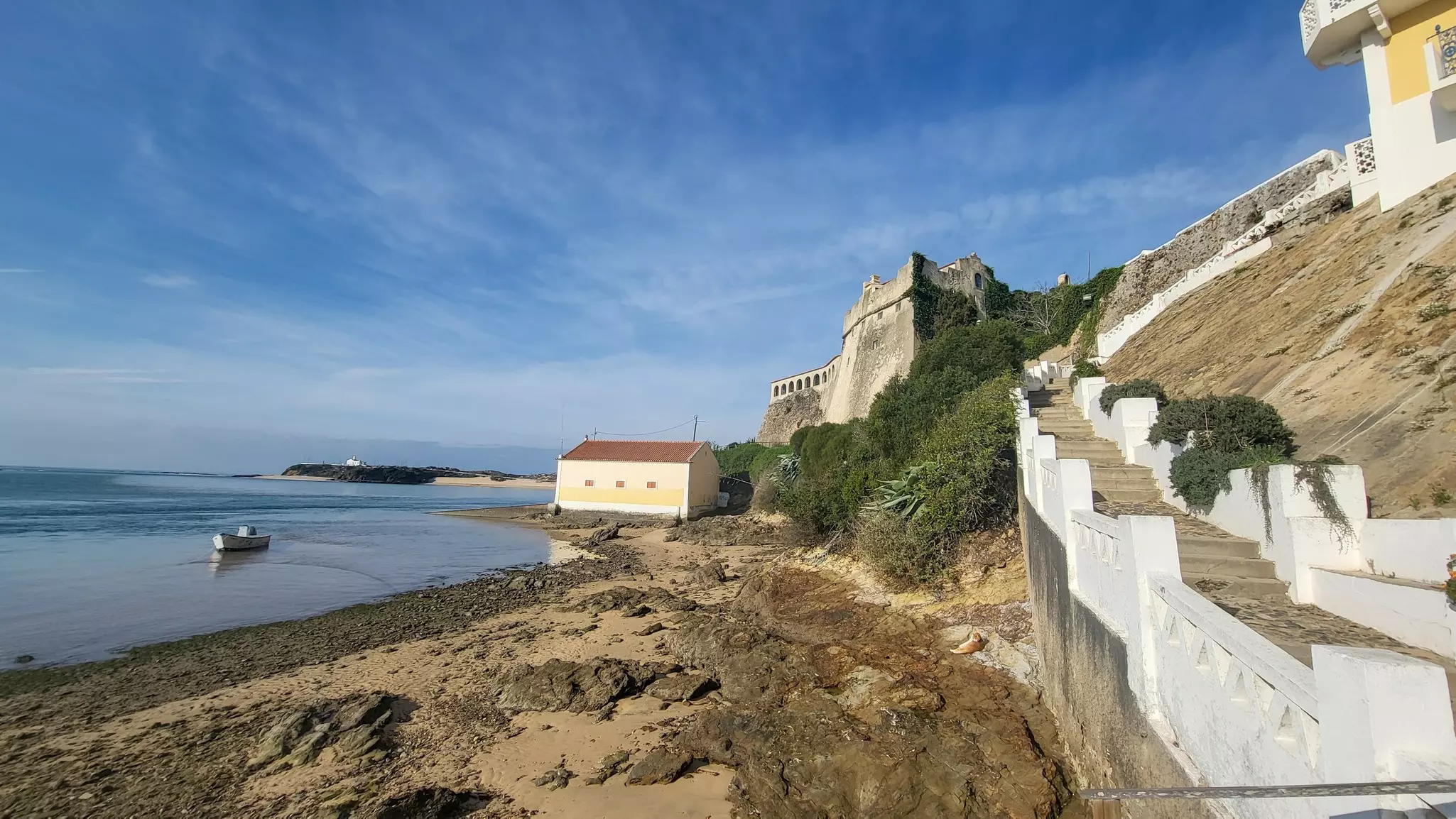 A stone path leads to an old fort overlooking the water.