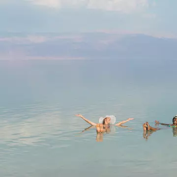 Lovely girls floating in salty water of Dead Sea and with Arms outstretched . Unusual buoyancy caused by high salinity.
525436087
African Descent, Arms Outstretched, Beach, Beauty In Nature, Bikini, Cheerful, Comfortable, Dead Sea, Enjoyment, Ethiopian Ethnicity, Female, Floating On Water, Freedom, Friendship, Gesturing, Getting Away From It All, Healthcare And Medicine, Healthy Lifestyle, Historical Palestine, Holding, Israel, Jordan, Journey, Joy, Lake, Lying On Back, Mineral, Mountain, Multi-Ethnic Group, Nature, Only Women, People, Recreational Pursuit, Relaxation, Salt, Sunbathing, Tan, Tourist, Tourist Resort, Tranquil Scene, Travel, Travel Destinations, Travel Locations, Two People, Vacations, Water, Women, Young Adult, Young Women, nowhere, salinity