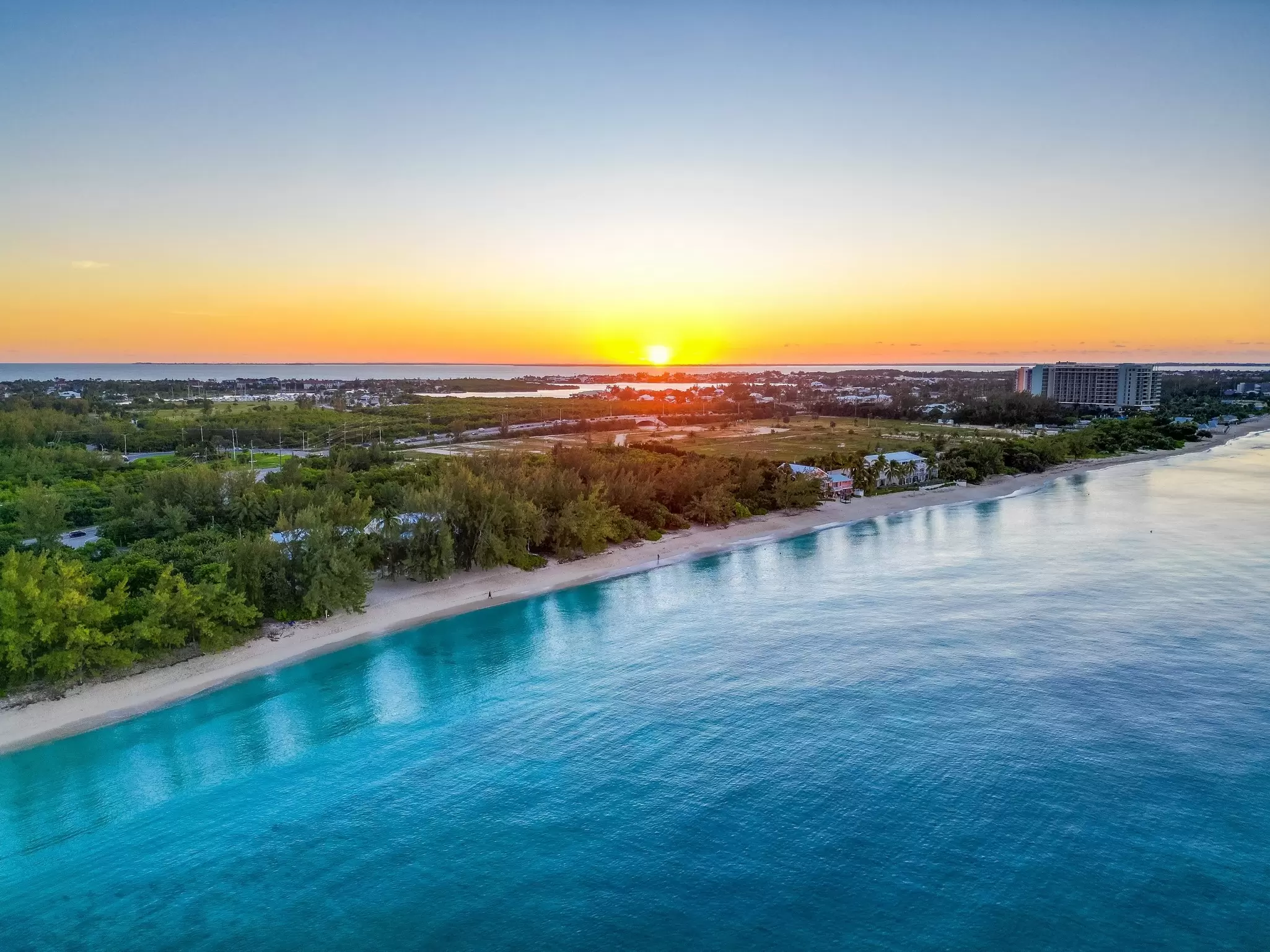 Sunrise over Seven Mile Beach, Grand Cayman. Words As Photos/Shutterstock