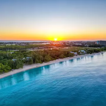 Sunrise over Seven Mile Beach, Grand Cayman. Words As Photos/Shutterstock