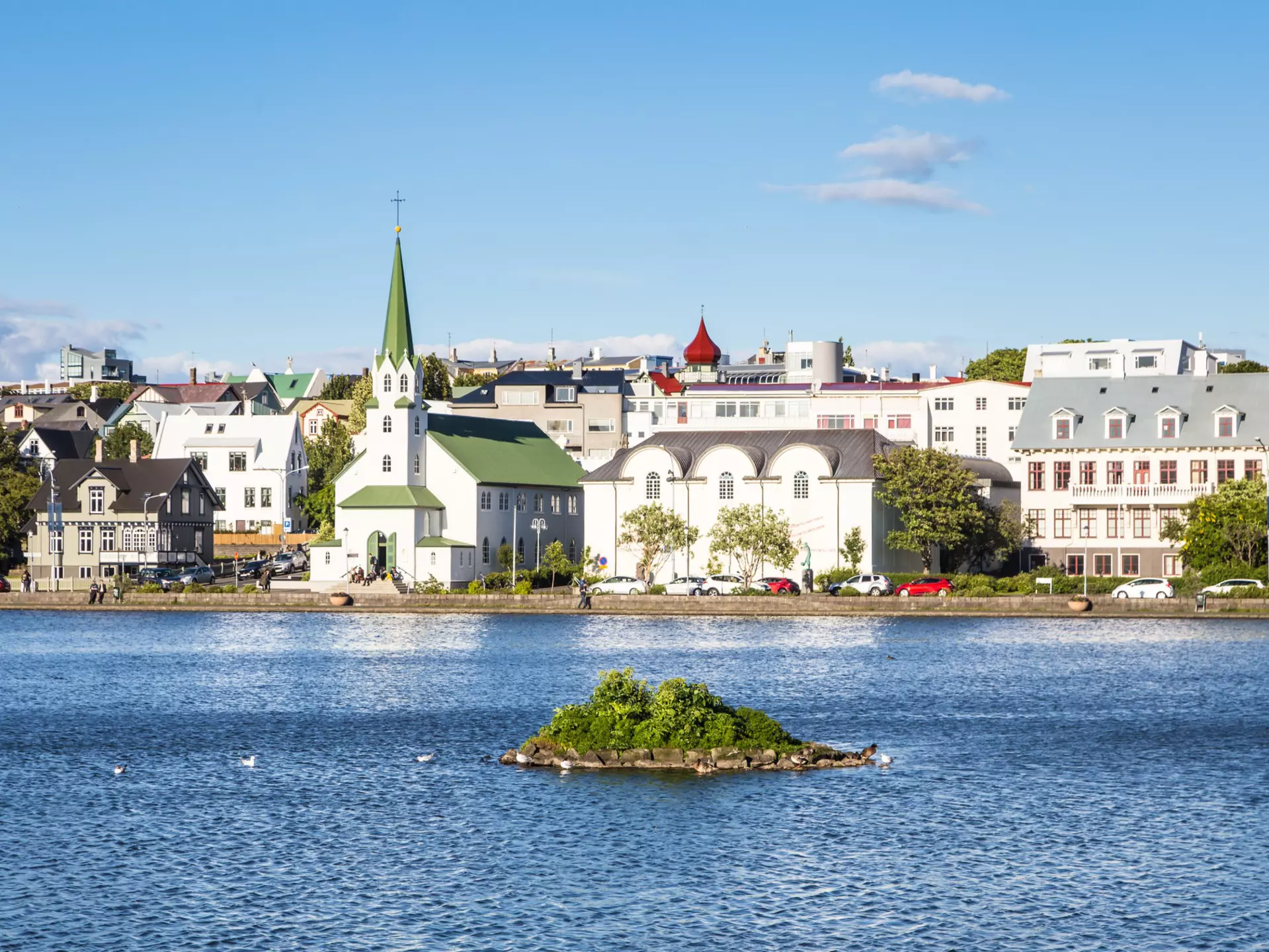 Reykjavik cityscape viewed from across the Tjornin lake. AsiaTravel/Shutterstock