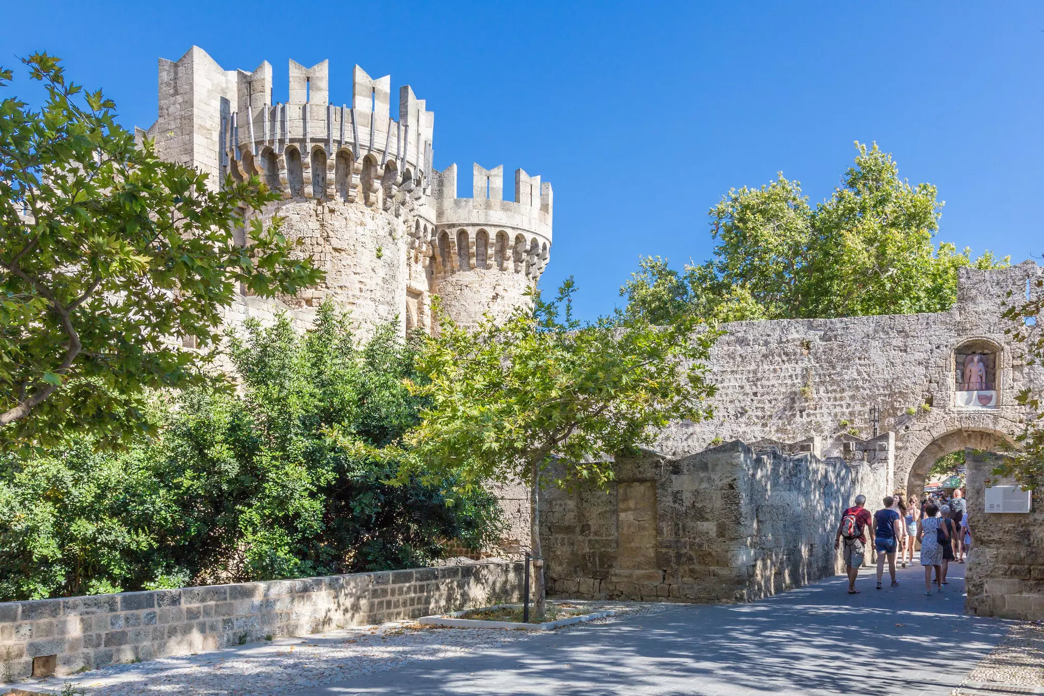 A historic round tower and fortress gate
