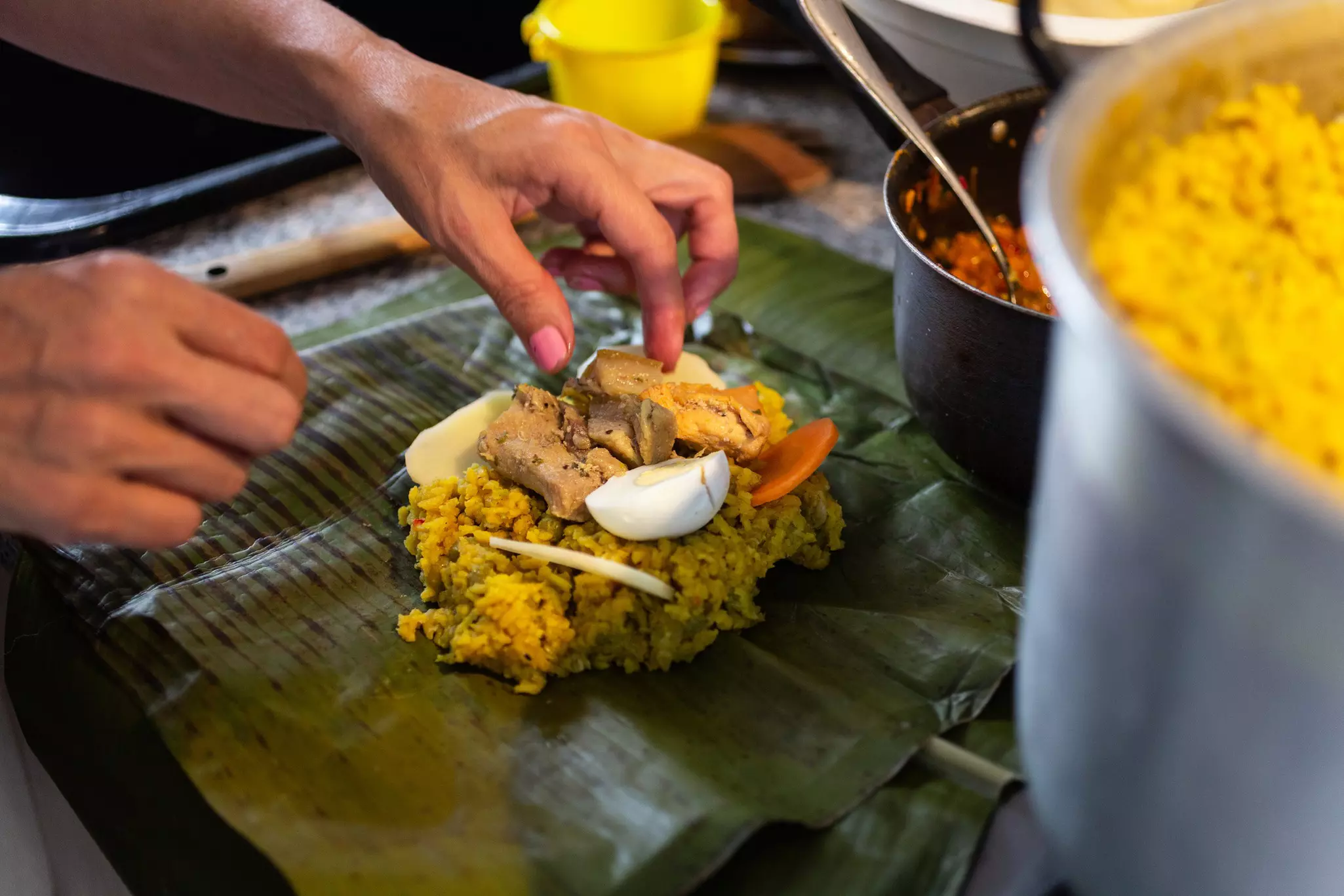 Tamales include spiced maize with meat and vegetables wrapped in a banana leaf © shariffmardini / Getty Images