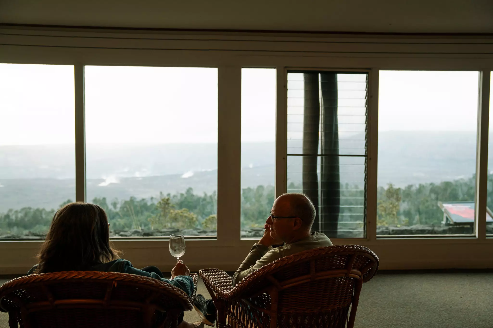 Volcano, HI. Dec 8, 2024. A viewing area in the Volcano House lobby looks out over Halemaumau Crater. Guests can bring drinks from Uncle George’s to the area and watch the sun set.Photo Credit: Michelle Mishina Kunz // @michelle.mishina
BIT 2026