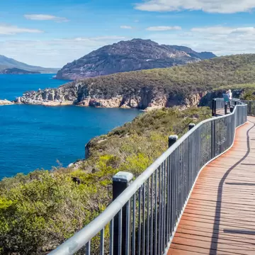 View of the walkway along Cape Tourville Walk in Freycinet National Park in Tasmania, Australia.  