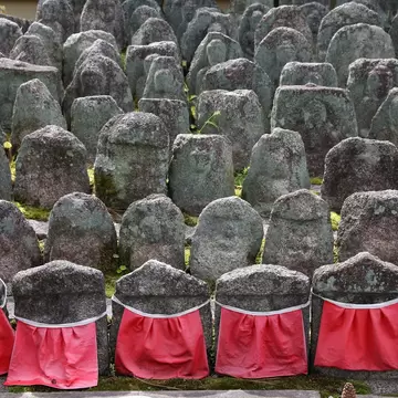 Small jizo statues at the Daitokuji Temple.
241691335
zen, sightseeing, stone, famous, sculpture, temple, travel, red, kyoto, statue, culture, landmark, tourism, religion, buddhist, east, japanese, bodhisattva, japan, asia, asian, buddhism, religious, jizo, ksitigarbha, daitokuji, rinzai, daitoku, ji