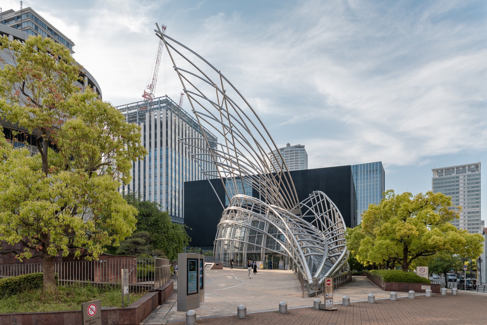 OSAKA, JAPAN - APRIL 28, 2023 : Osaka National Museum of Art located in Nakanoshima has beautiful sculptured appearance with museum located underground  License Type: media  Download Time: 2024-05-22T23:43:18.000Z  User: mvm_lonelyplanet  Is Editorial: Yes  purchase_order:   