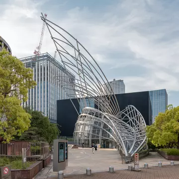 OSAKA, JAPAN - APRIL 28, 2023 : Osaka National Museum of Art located in Nakanoshima has beautiful sculptured appearance with museum located underground  License Type: media  Download Time: 2024-05-22T23:43:18.000Z  User: mvm_lonelyplanet  Is Editorial: Yes  purchase_order:   