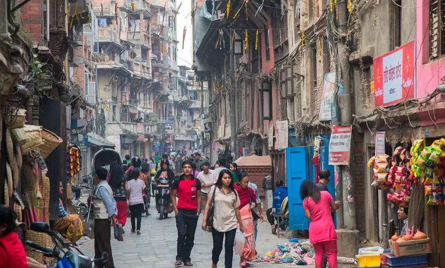 People crowd the street in the Asan Tole market region of Kathmandu.