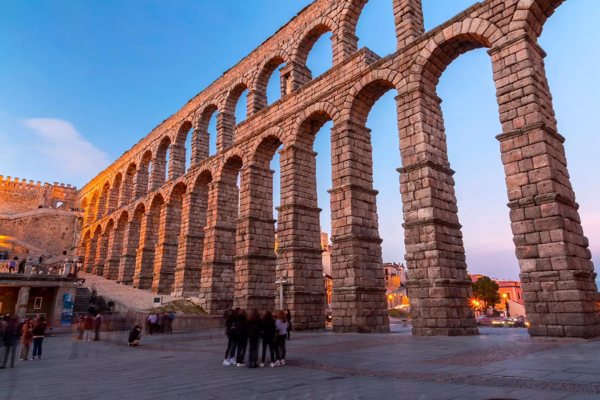 Segovia, Spain - February 18, 2022: The ancient Roman aqueduct of Segovia, one of the best-preserved elevated Roman aqueducts and the foremost symbol of Segovia.  License Type: media  Download Time: 2023-02-02T04:31:25.000Z  User: claramonitto  Is Editorial: Yes  purchase_order:   