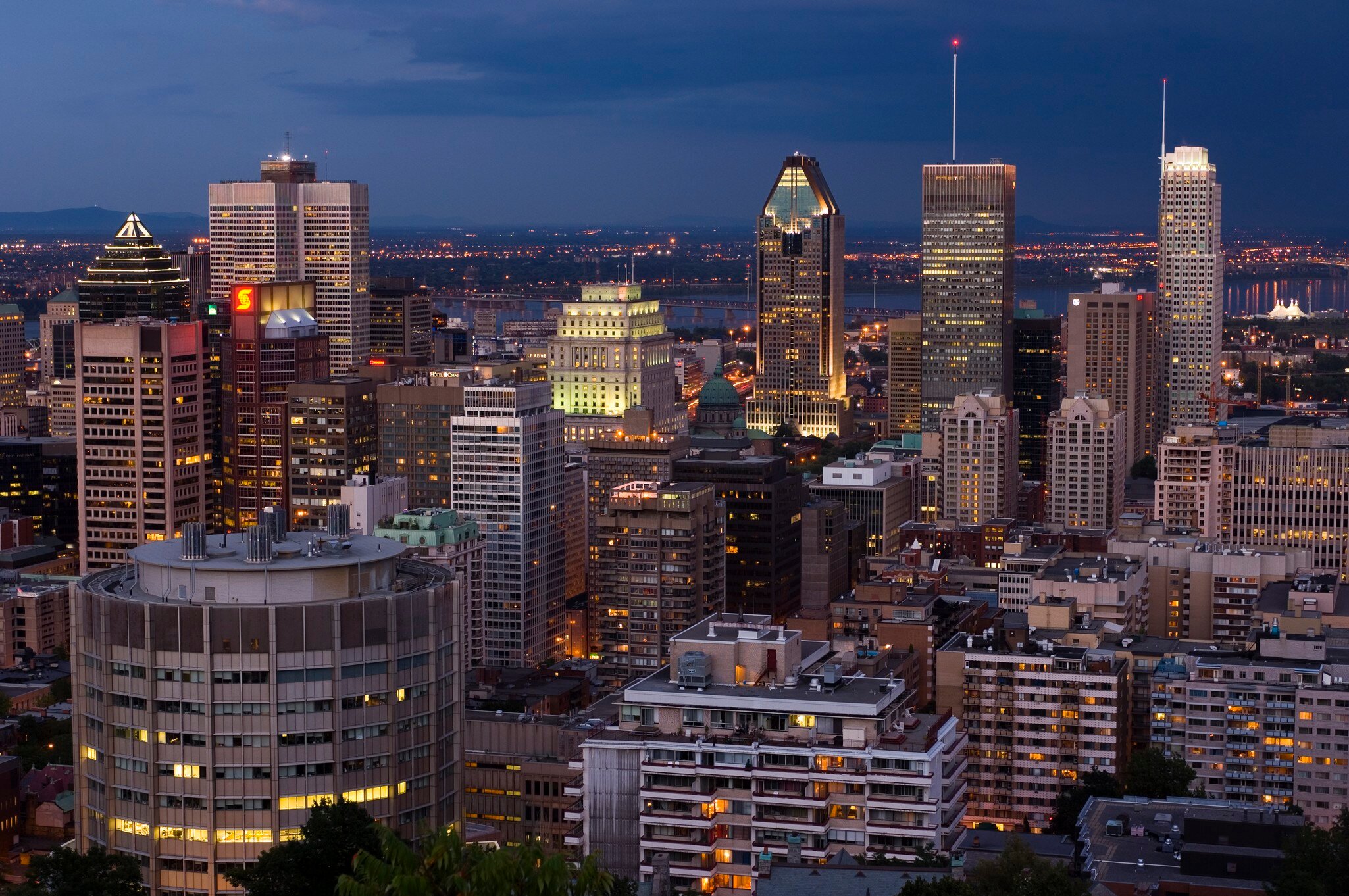 skyline view at twilight from the lookout atop Mt. Royal, Montreal, Quebec, Canada.