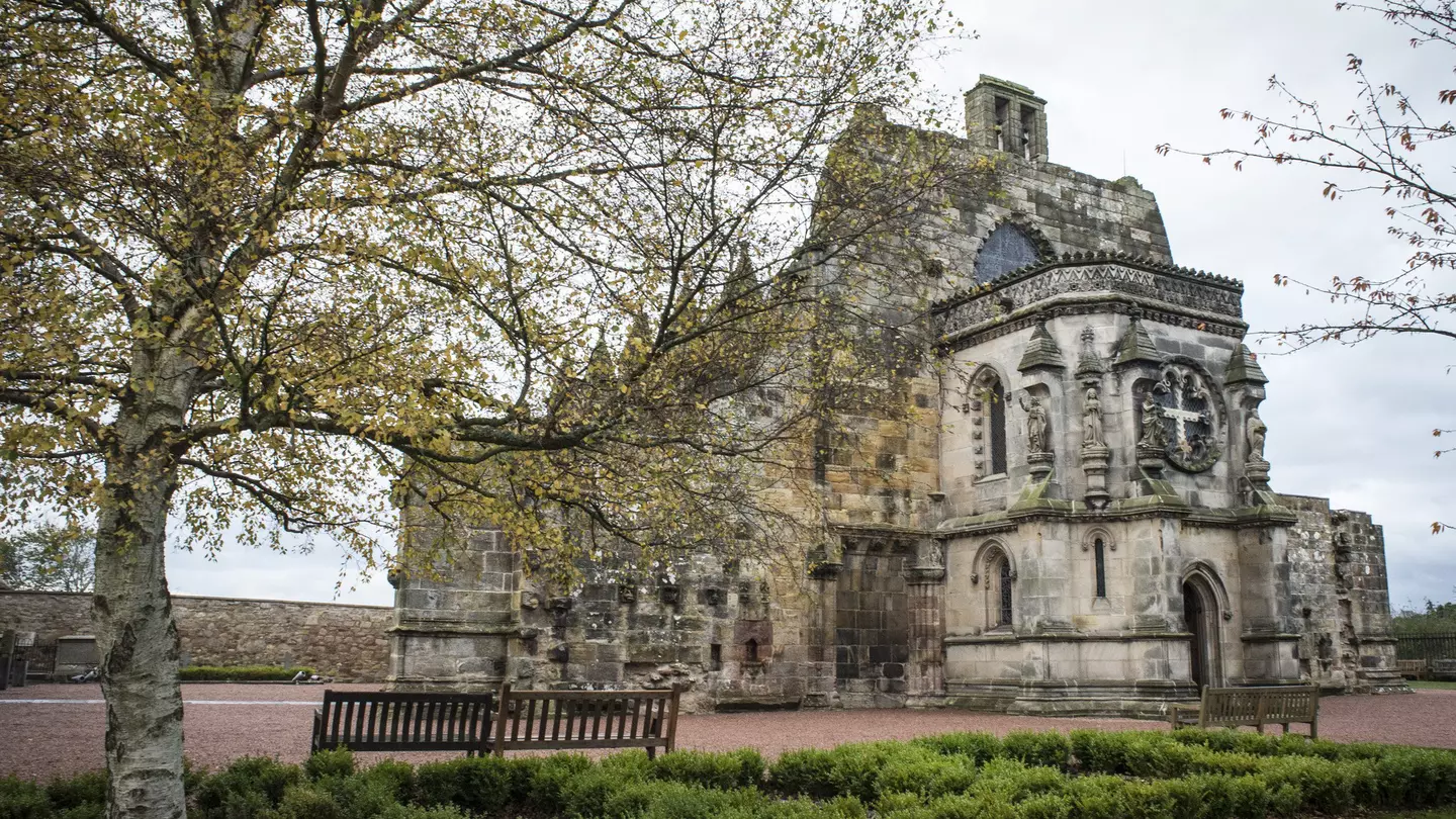 Rosslyn Chapel near Edinburgh, Scotland as pictured behind trees