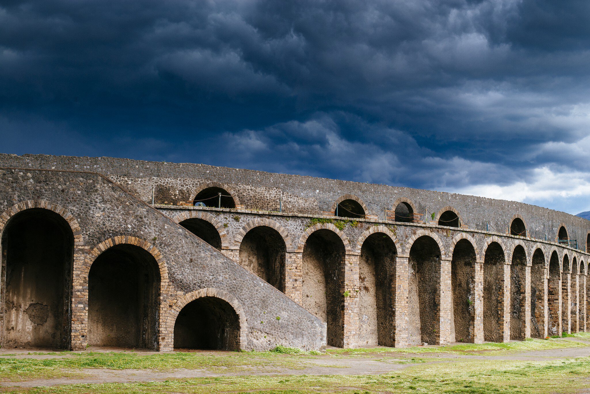 Storm clouds over Colosseum, Pompeii.
