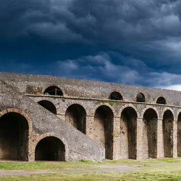 Storm clouds over Colosseum, Pompeii.