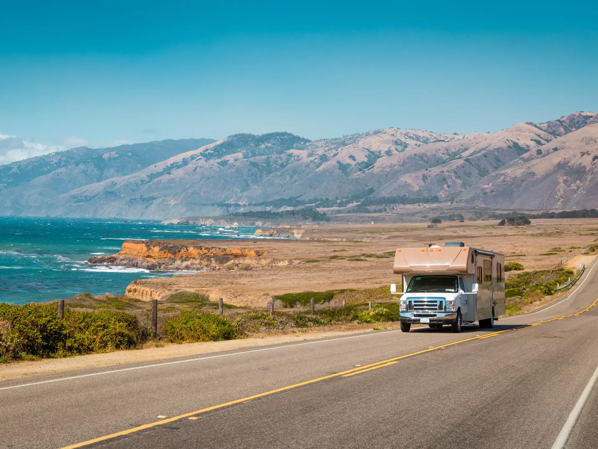 Panorama view of recreational vehicle driving on famous Highway 1 along the beautiful Central Coast of California, Big Sur, USA, License Type: media, Download Time: 2025-11-11T18:39:06.000Z, User: meg3348277, Editorial: false, purchase_order: 56530 - Guidebooks, job: Global Publishing-WIP, client: Lonely Planet 'Journey - Pacific Coast Highway 1', other: Megan Cassidy