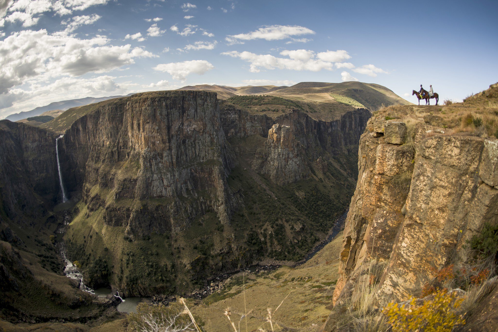 Two horsemen looking Maletsunyane Falls, Highlands, Lesotho