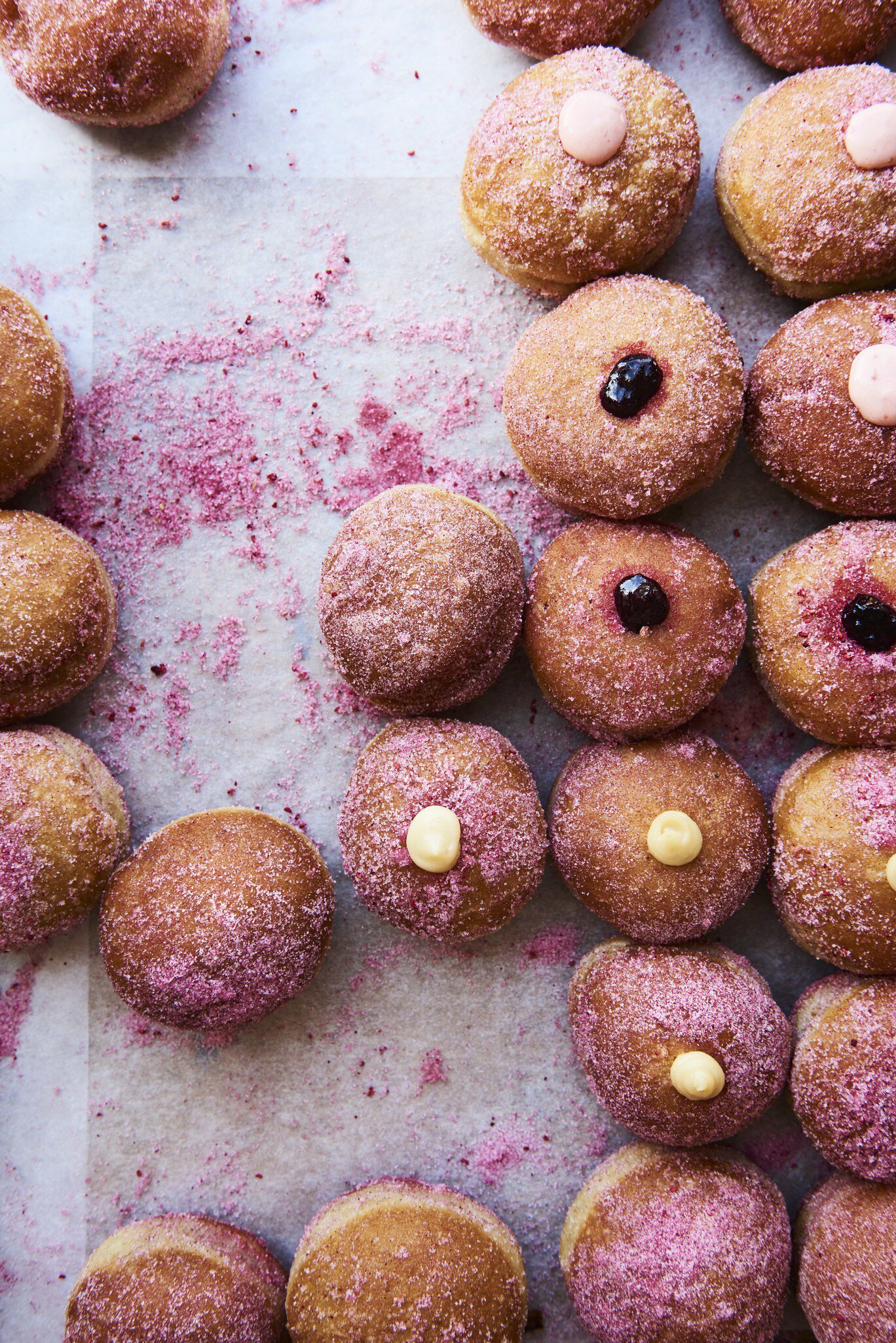 Raspberry sugar berliners, aka doughnuts, from Lille Bakery in Refshaleøen. Copenhagen, Denmark.
