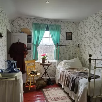 View of a bedroom within the original house at the Green Gables Heritage Place in PEI, Canada.