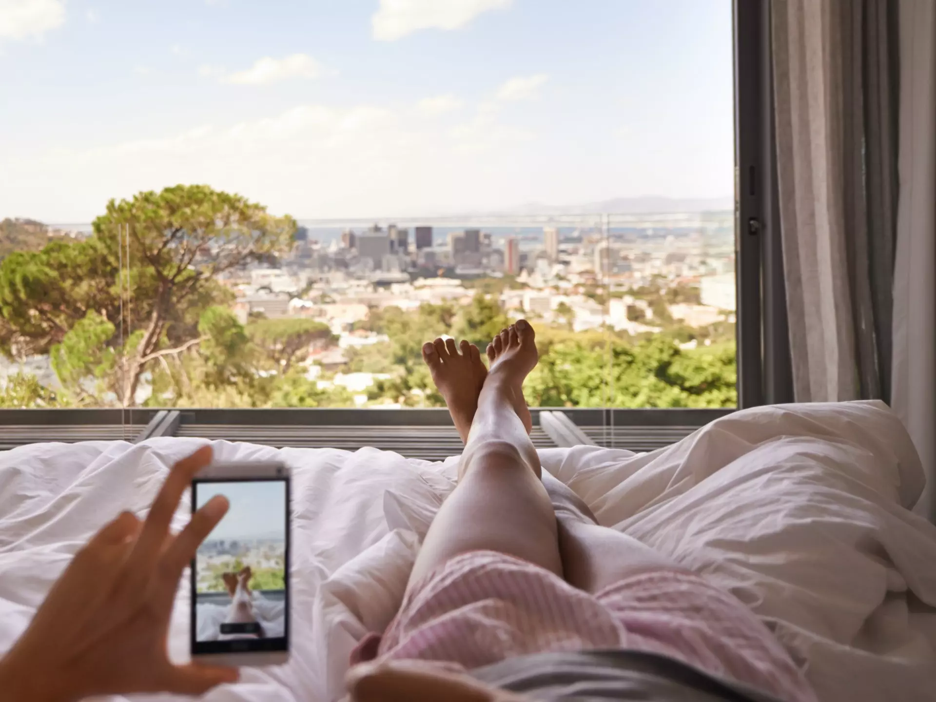 Cropped shot of a woman in bed taking a picture of the view from her bedroom
514363129
20-29 Years; 20s; Adult; Adults Only; Apartment; Barefoot; Bed; Bedroom; Break; Cityscape; Comfort; Comfortable; Communication; Copy Space; Cozy; Day; Device Screen; Enjoyment; Ethnicity; Female; Females; Freshness; Glass - Material; Glasses; Hold; Holding; Home Interior; Horizontal; Hotel; House; Human Body Part; Human Foot; Human Leg; Human Limb; Idyllic; Indoors; Leisure Activity; Limb; Looking At View; Looking Through Window; Low Section; Lying Down; Memories; Memory; Mobile Phone; Morning; One Person; One Woman Only; One Young Woman Only; Only Women; Pajamas; Part; Part Of; People; Photography; Portable Information Device; Pursuit; Pursuit - Concept; Reclining; Relaxation; Reminder; Resting; Satisfaction; Screen; Sky; Smart Phone; Solitude; Summer; Technology; Touch Screen; Touching; Tranquil Scene; Tree; Unrecognizable Person; Vacations; Weekend Activities; Window; Wireless Technology; Women; Young Adult; Young Women;