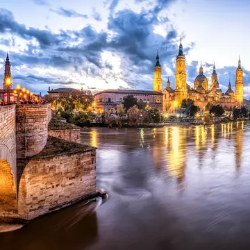 Basílica de Nuestra Señora del Pilar rising above the River Ebro in Zaragoza, Spain. 