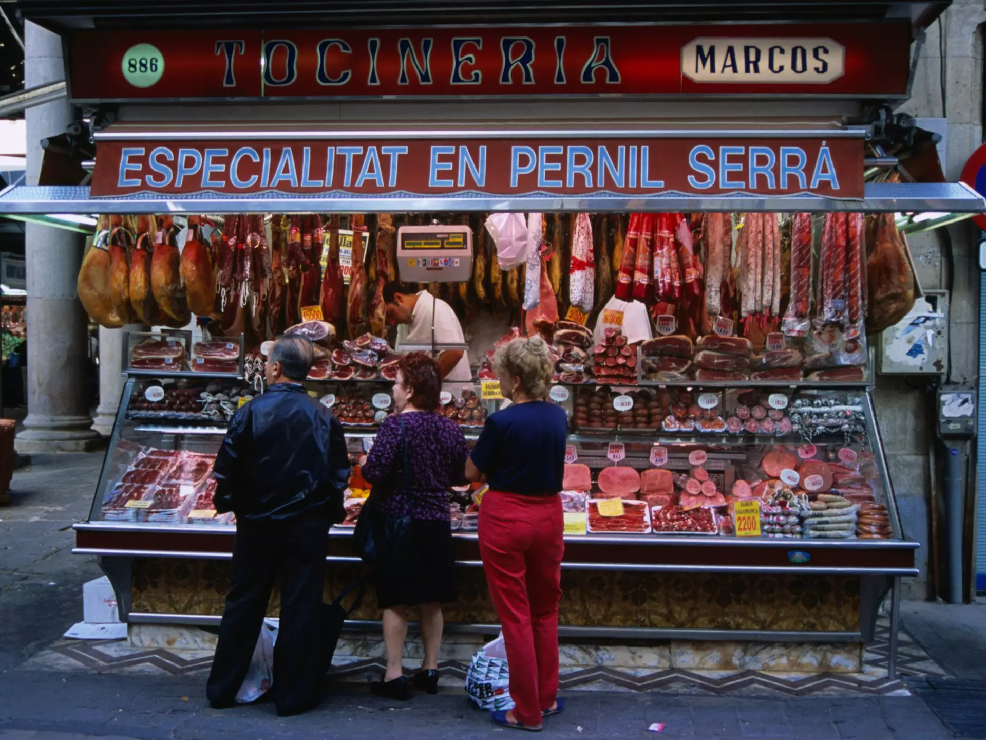 Locals shop in Mercat de Santa Caterina market in the La Rambla area of Barcelona, Spain.