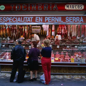 Locals shop in Mercat de Santa Caterina market in the La Rambla area of Barcelona, Spain.