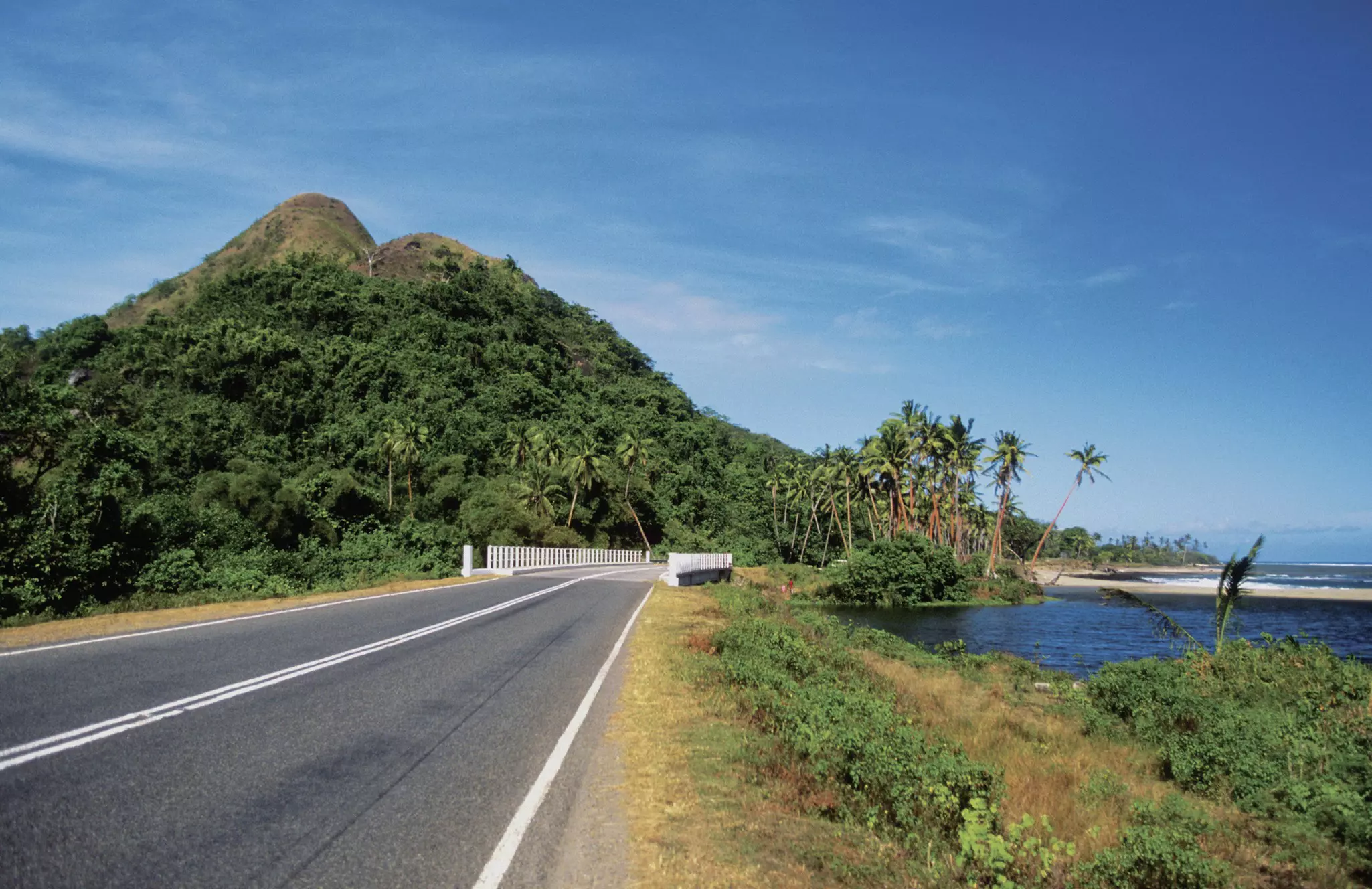 Pause on your drive along the Coral Coast to snorkel on the colorful reef or try out a surf spot © Medioimages / Photodisc / Getty Images
