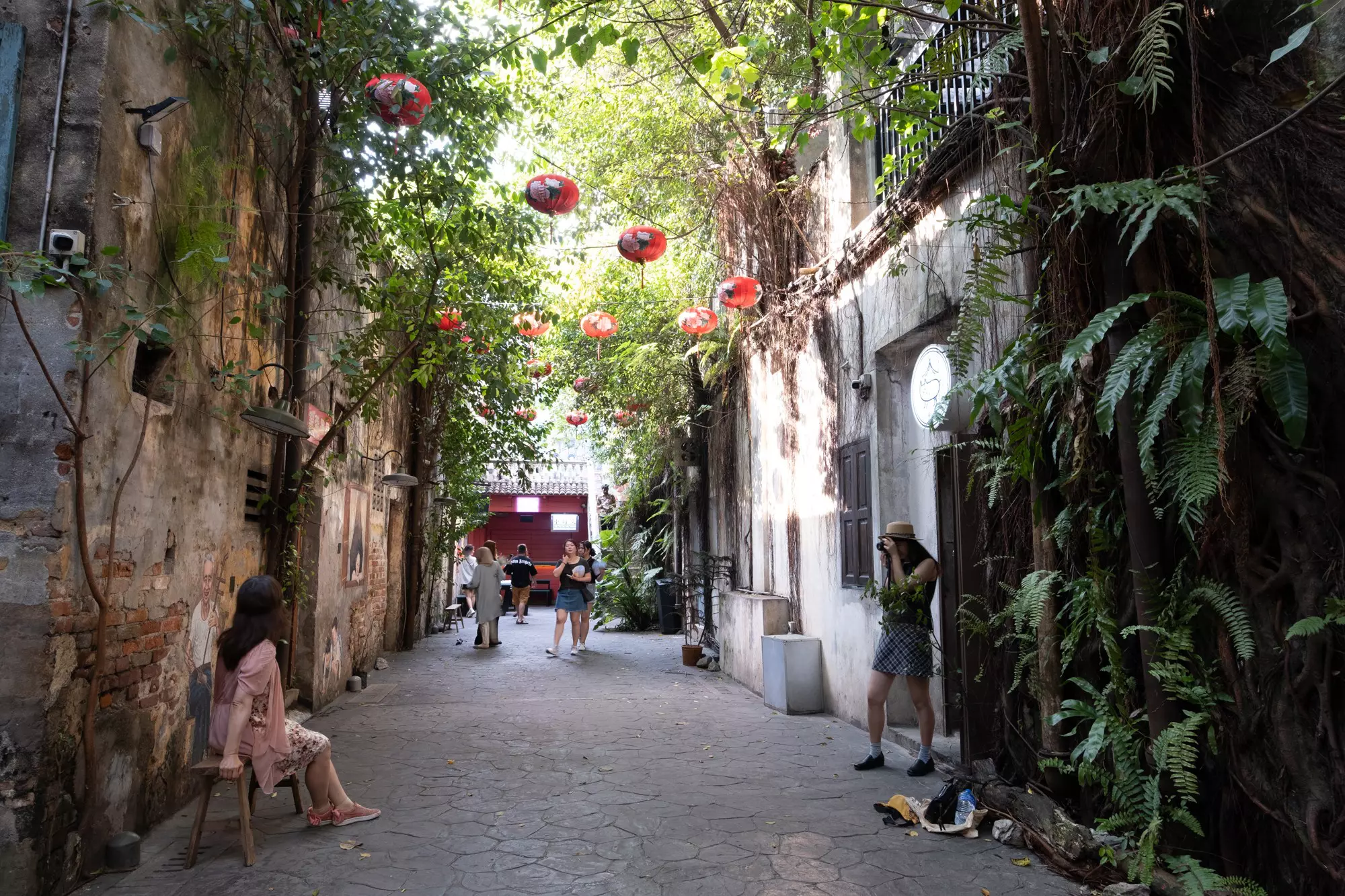 Spend a day exploring Kuala Lumpur, including the Kwai Chai Hong Alley, which is filled with murals and trendy bars © Kit Yeng Chan / Lonely Planet