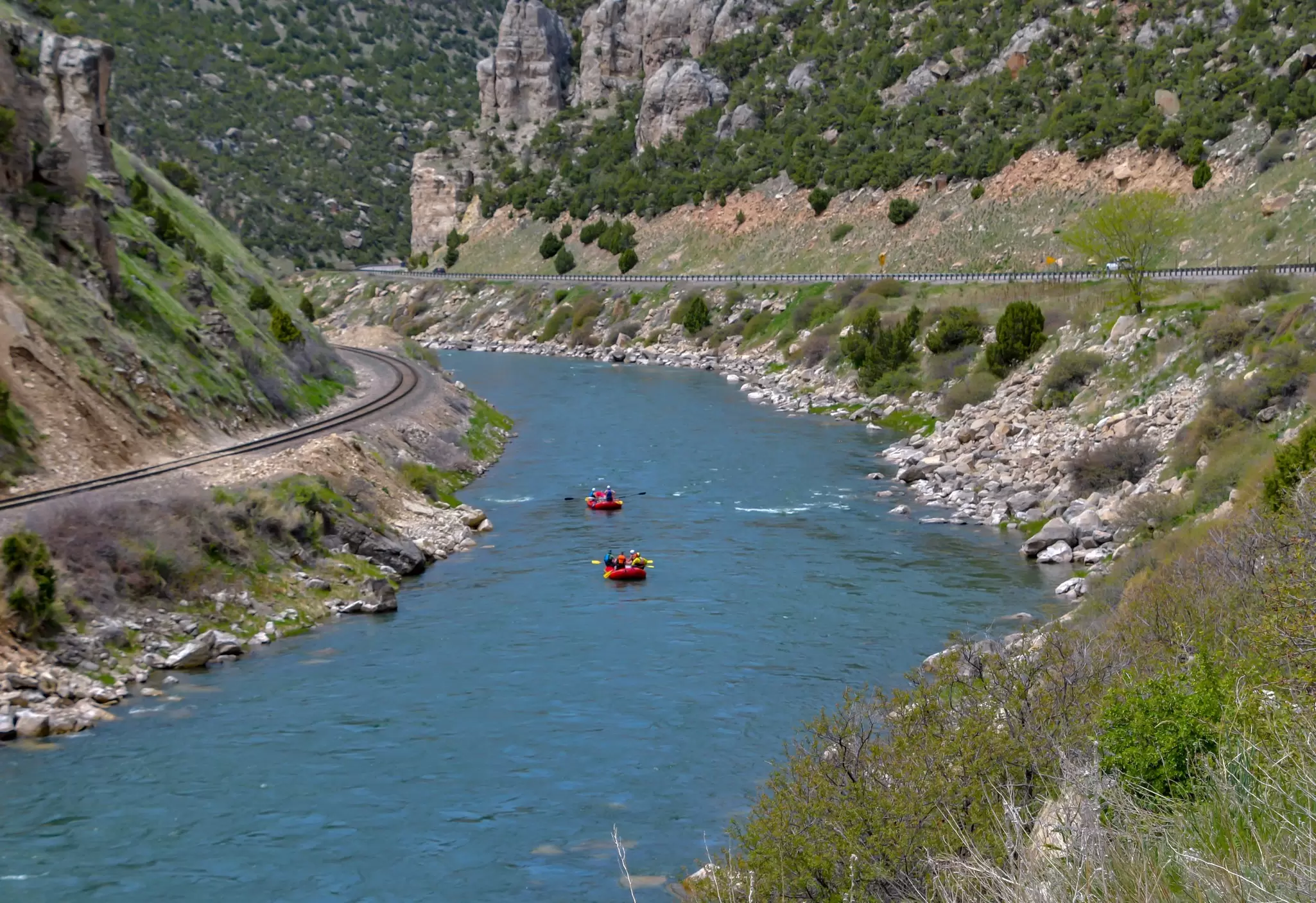 Two rafts following the scenic Wind River near Dubois in Wyoming. 