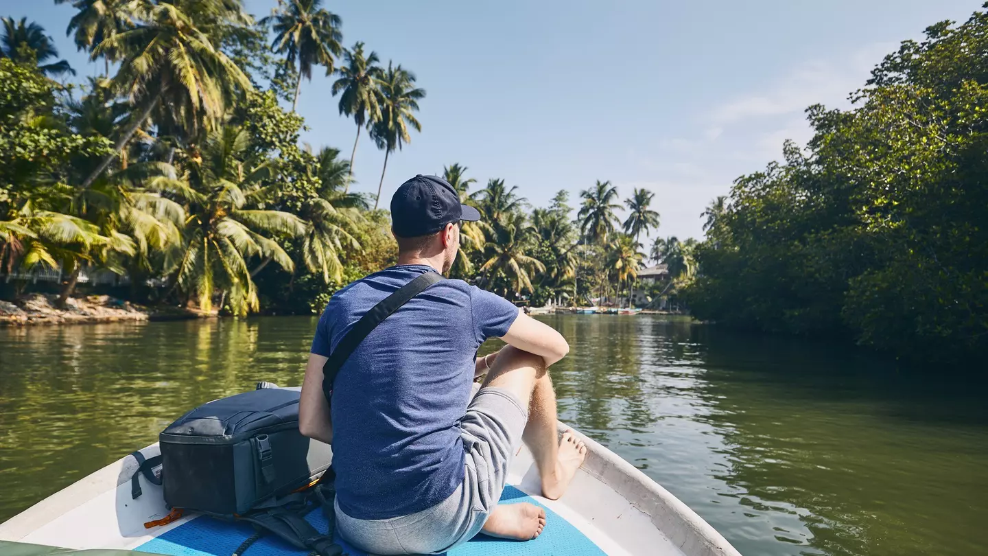The serene waters of Sri Lanka's Madu River are best explored by boat. Chalabala / Getty Images