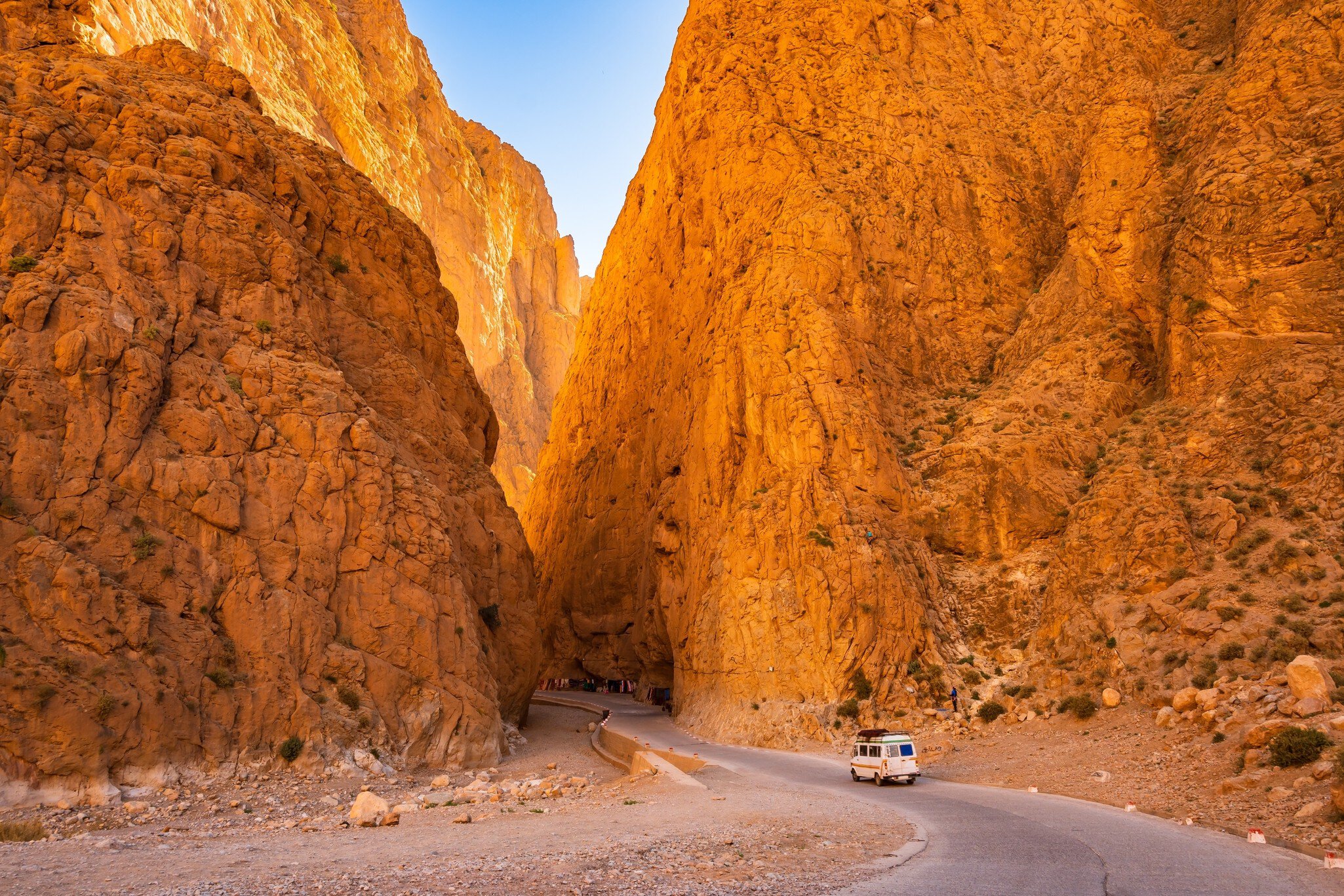 Car driving on narrow scenic road in Dades Gorge canyon with mountains in background, Morocco, North Africa, License Type: media, Download Time: 2025-03-27T20:56:04.000Z, User: dogutierrez_redventures, Editorial: false, purchase_order: 65020 - Marketin...