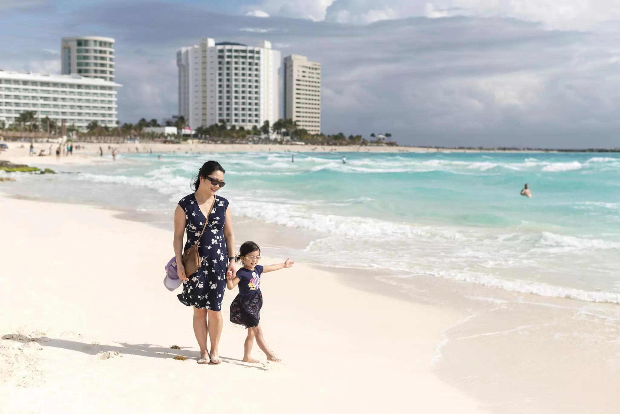 Mother and daughter admiring the Caribbean sea