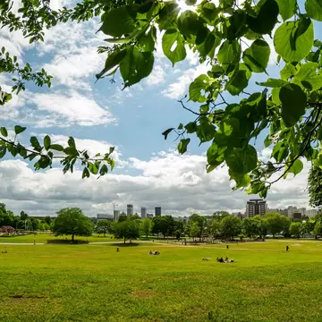View of Tantolunden park on Södermalm with buildings in Liljeholmskajen in the background - in Stockholm, Sweden
