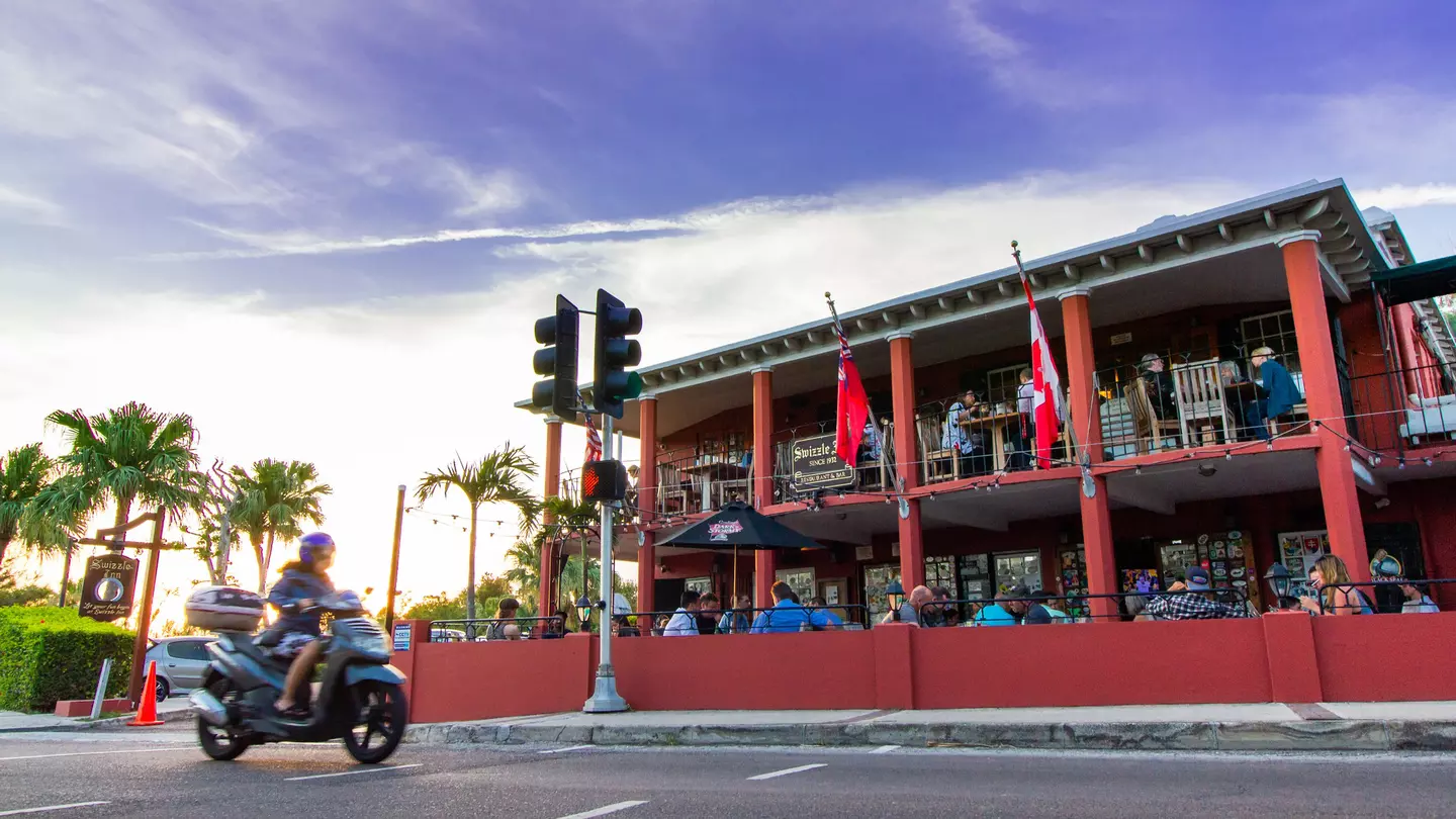 Bermuda - May 5 2017: The Swizzle Inn Pub and Restaurant, a Bermuda destination for good food and drink, home to the "Rum Swizzle".; Shutterstock ID 1767758654; your: AnneMarie McCarthy; gl: 65050; netsuite: Online Editorial; full: Bermuda when to go
