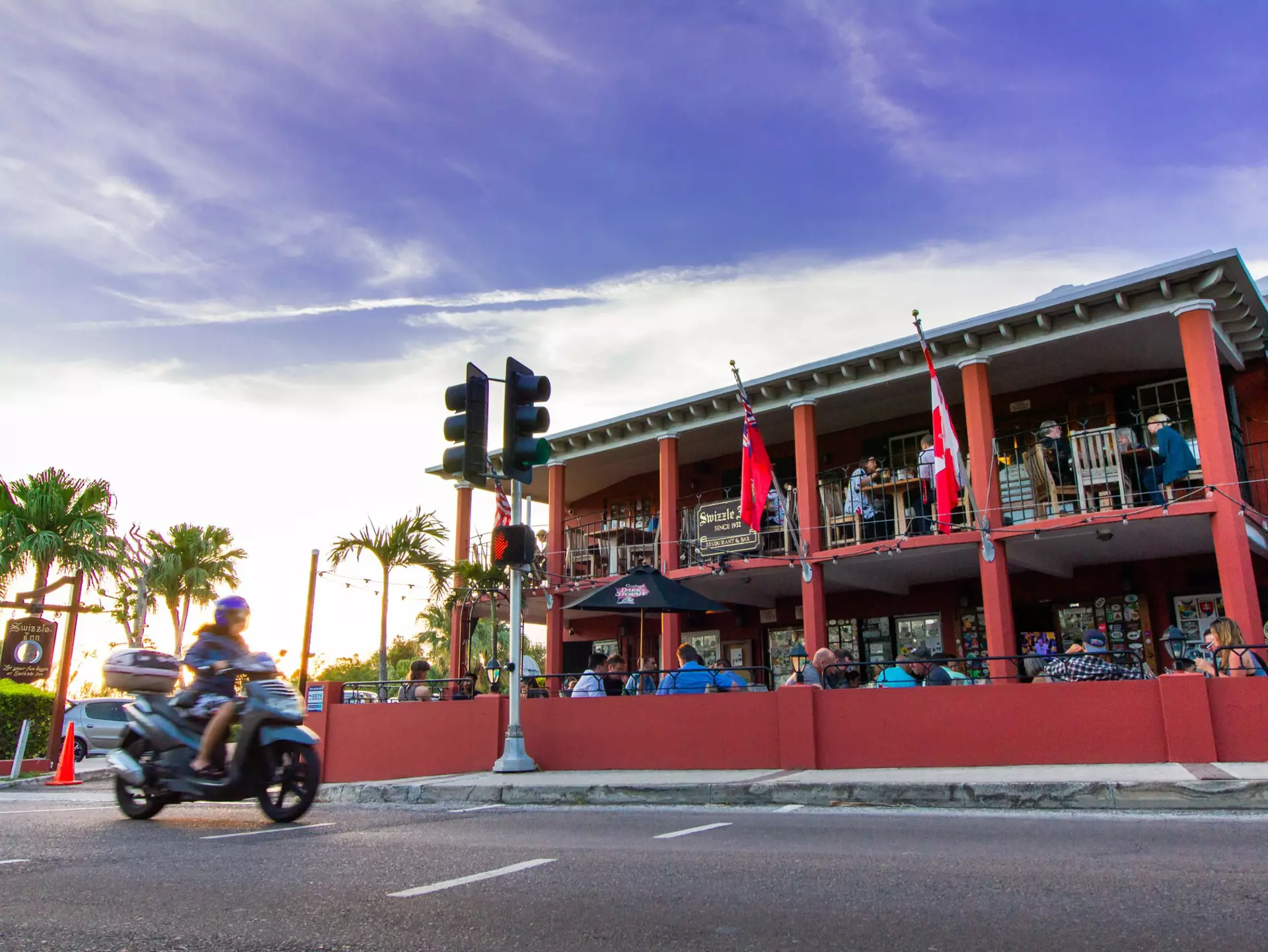 Bermuda - May 5 2017: The Swizzle Inn Pub and Restaurant, a Bermuda destination for good food and drink, home to the "Rum Swizzle".; Shutterstock ID 1767758654; your: AnneMarie McCarthy; gl: 65050; netsuite: Online Editorial; full: Bermuda when to go