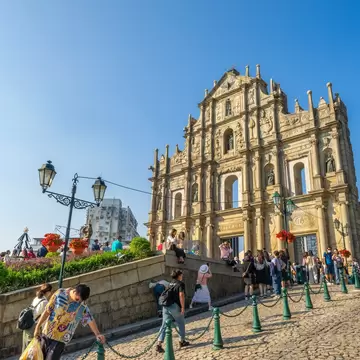 Macau, China - November 27, 2023:  Many tourists visit the ruins of St. Paul cathedral, landmark and popular for tourist attractions in Macau., License Type: media, Download Time: 2025-03-10T19:52:09.000Z, User: dermothegarty77, Editorial: true, purchase_order: 56530 - Guidebooks, job: Global Publishing WIP, client: China 17, other: Dermot Hegarty