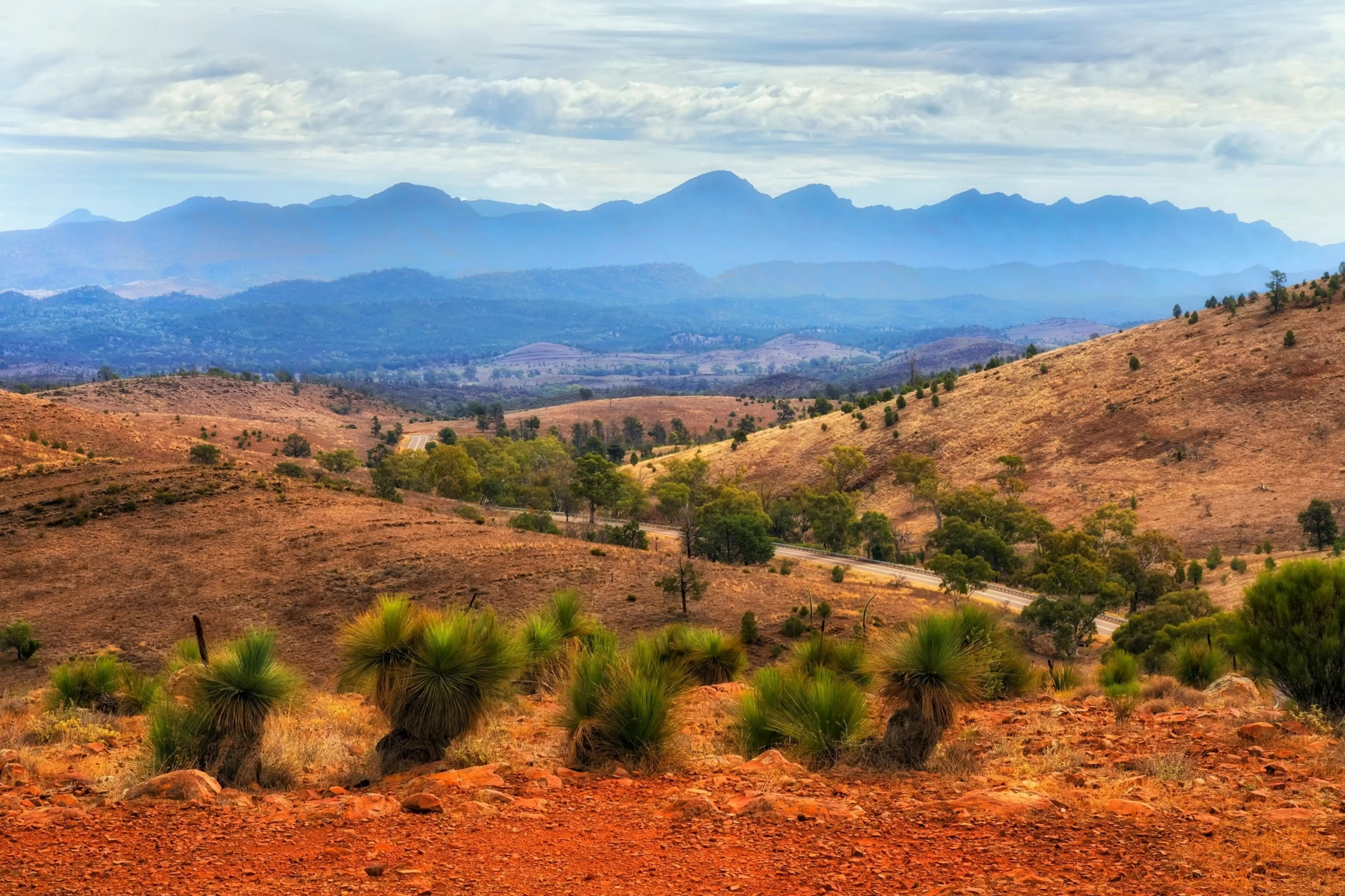 Hucks lookout in Flinders Ranges national park of South Australia to Wilpena Pount rock formation at sunset