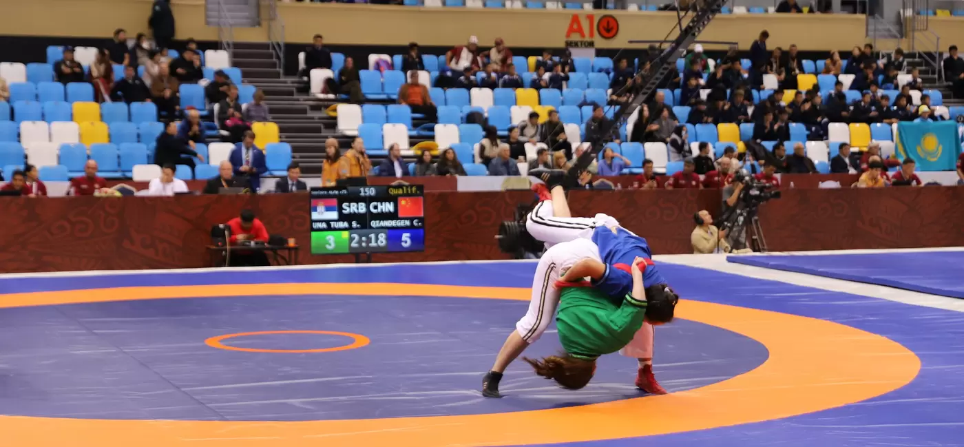 Wrestlers perform in an arena at the World Nomad Games.