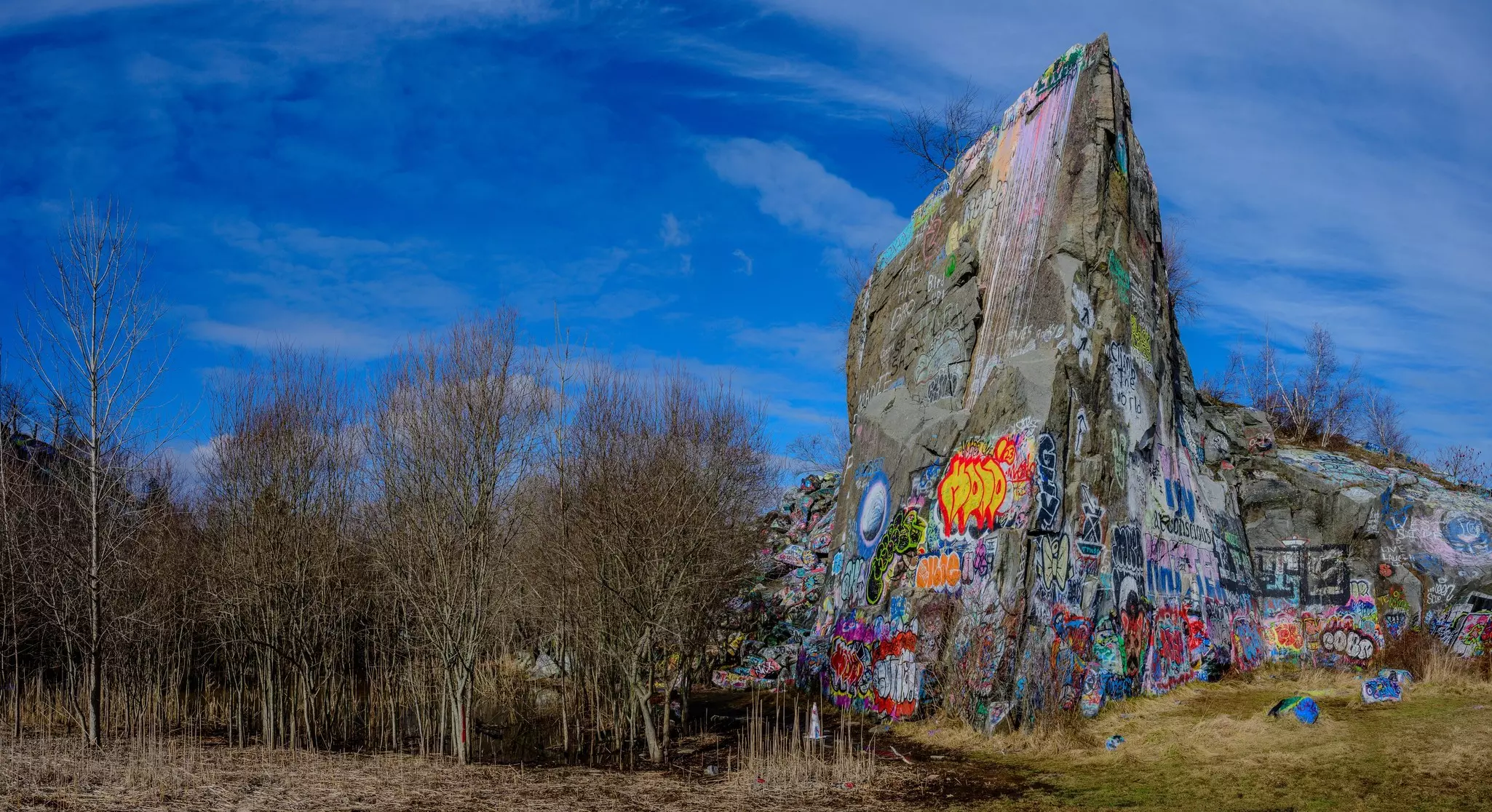 The now inactive Quincy Quarries, known for producing granite for over a century, have been reclaimed by the city and repurposed as a public green space