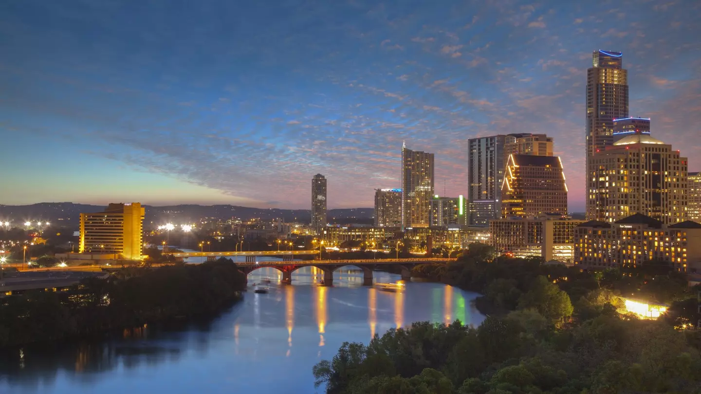 500px Photo ID: 95265045 - The Austin skyline on a wonderful April Evening rises above Lady Bird Lake and Zilker Park. Congress Bridge spans the river and connects the SoCo area with downtown.