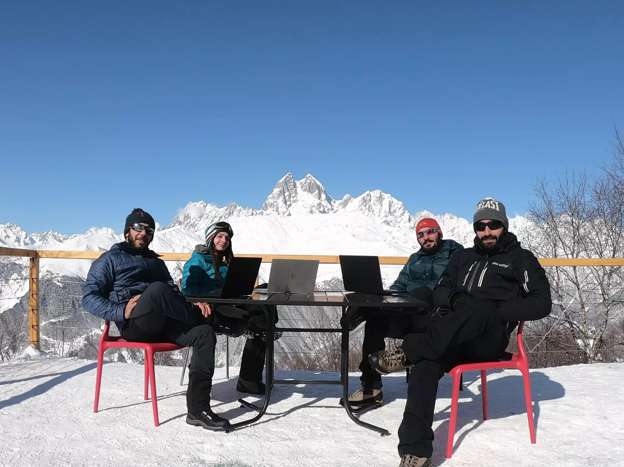 Hakob and his team take a break from trip planning with a gorgeous backdrop © Courtesy of Hakob Harutyunyan  