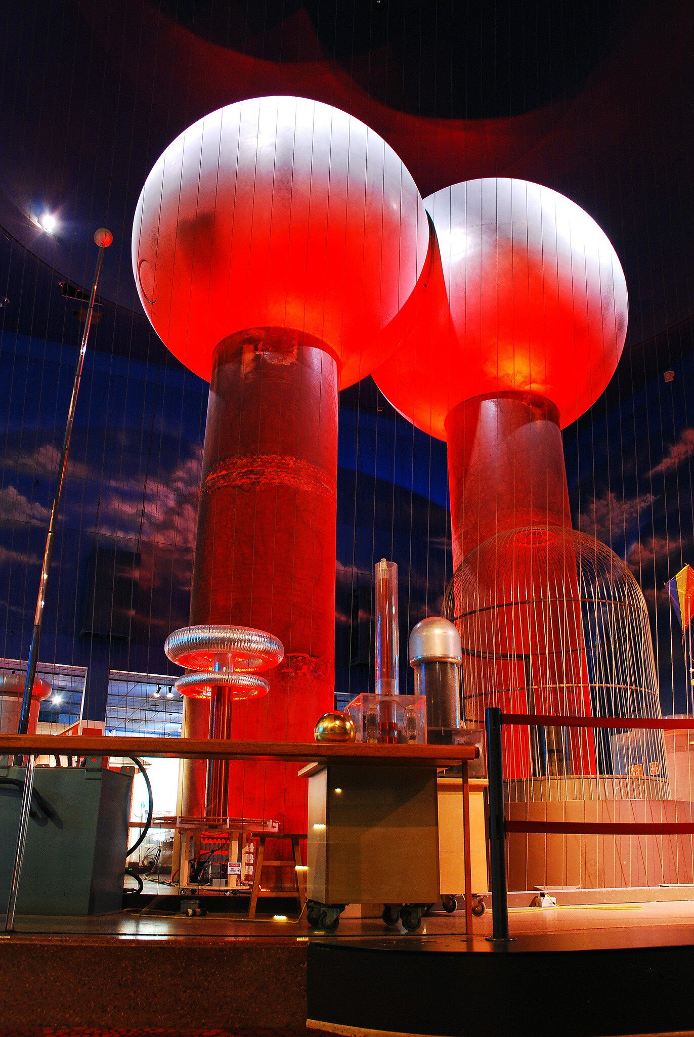 Two huge balls rise above an auditorium.