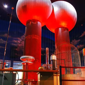 Two huge balls rise above an auditorium.