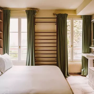 A book lover's dream room at Hotel Amour in Paris, France. PionPhotographie, via Hotel Amour