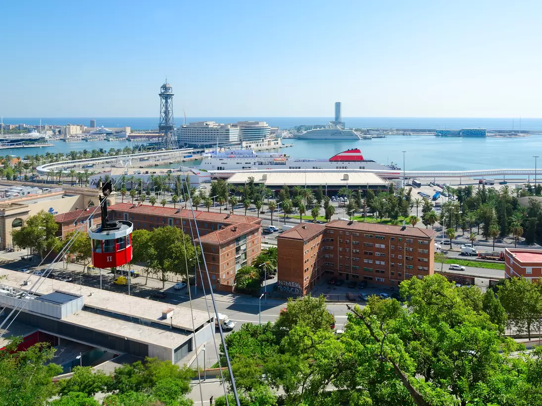 Telefèric de Montjuïc cableway, as seen from Mount Montjuic and heading to the Old Port.