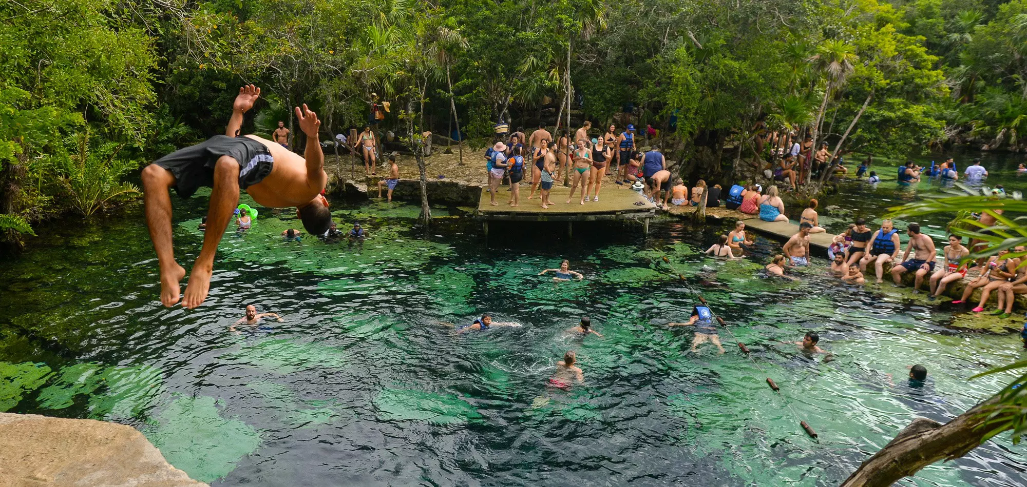Leap into a cenote in Playa Del Carmen © Artur Widak/NurPhoto via Getty Images