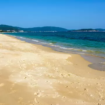 Sunny day, sand creaking, clear turquoise sea, coral reefs on the coast of Yalong Bay in South China Sea. Sanya, island Hainan, China. Nature Landscape., License Type: media, Download Time: 2026-09-02T16:20:37.000Z, User: LP_NZhan, Editorial: false, purchase_order: 65050 - Digital Destinations and Articles, job: App Content, client: Lonely Planet App, other: Nadine Zhan