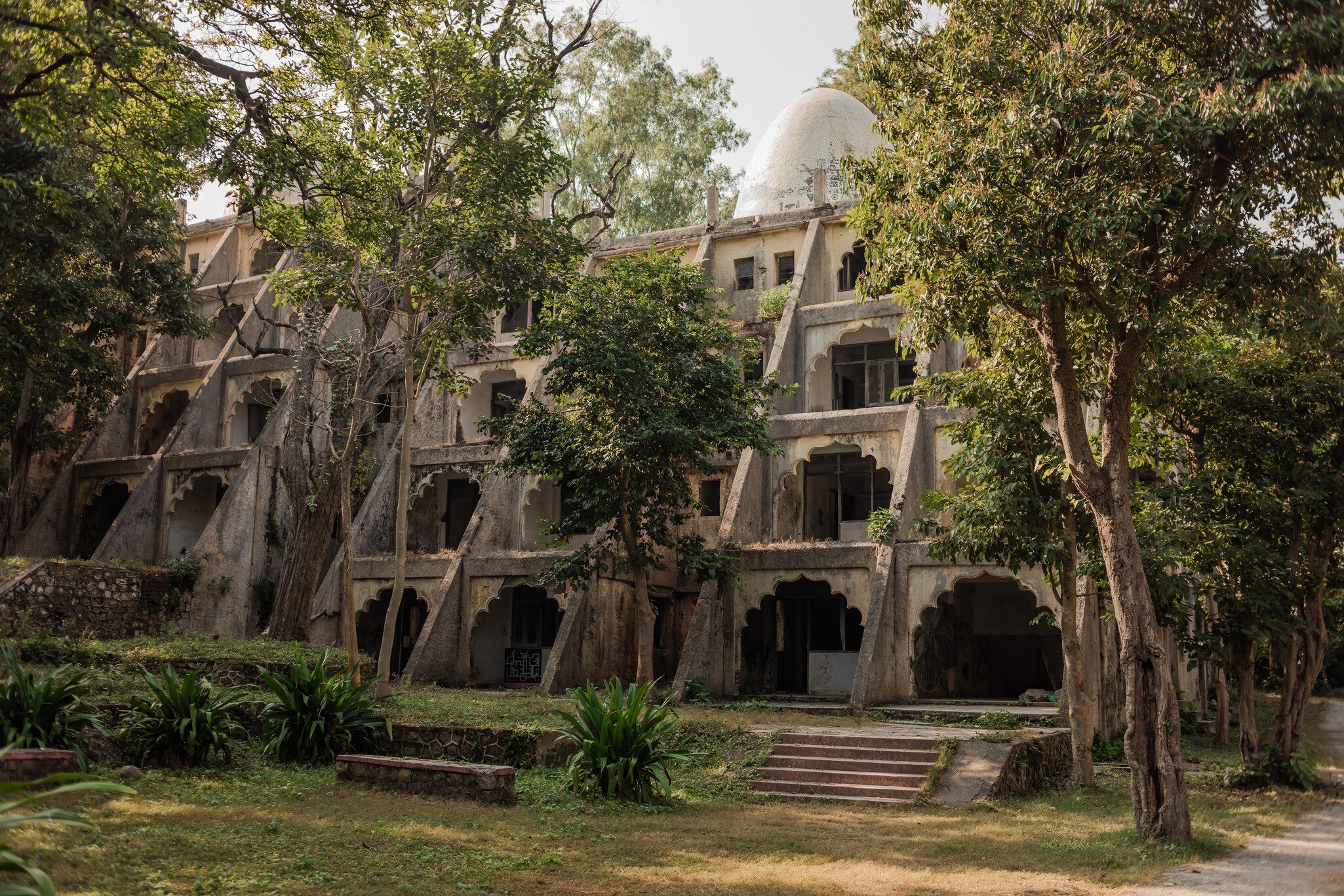 Beatles Ashram (Chaurasi Kutia) in Rishikesh, Northern India. Maharishi Mahesh Yogi Ashram. Meditation rooms. Iconic place where the Beatles stayed and learnt meditation; Shutterstock ID 2244431869; GL: 65050; netsuite: 65050; full: Poi; name: Len...