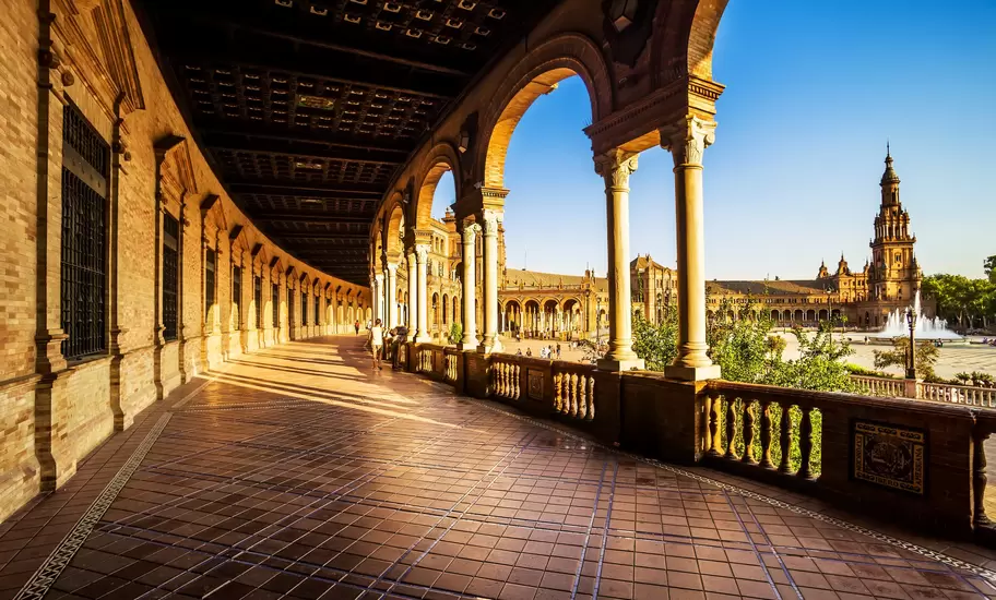 The late afternoon sun casting shadows in Spanish Square (Plaza de Espana).