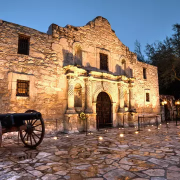 The illuminated exterior of The Alamo in San Antonio. 400tmax/Getty Images